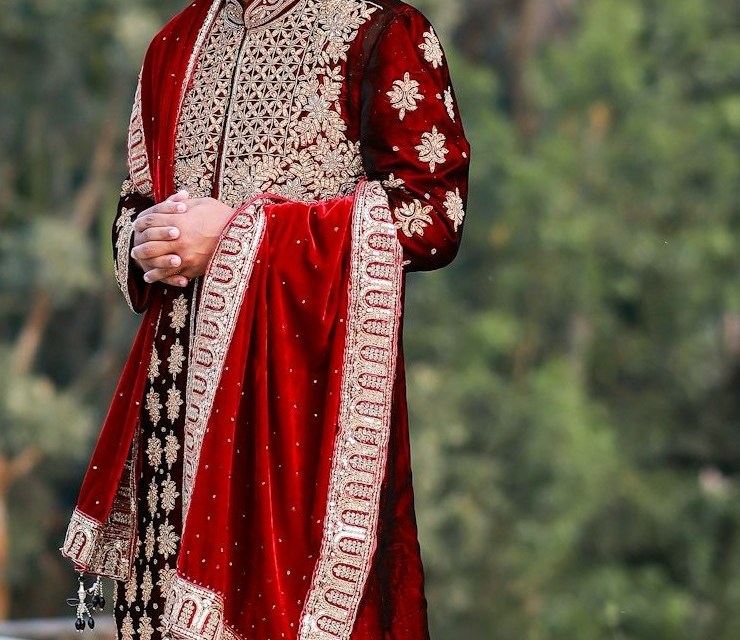 Maroon velvet sherwani with gold zardozi embroidery and stole