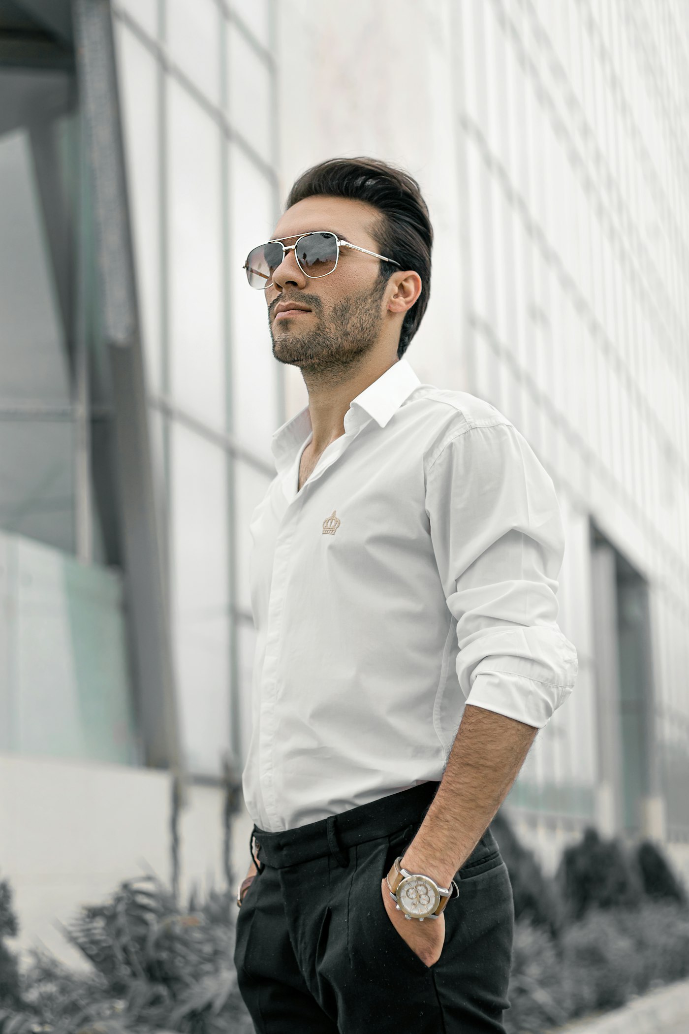 Crisp white bespoke shirt with rolled sleeves